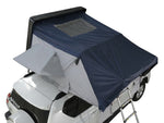 Load image into Gallery viewer, DesertX Basecamp hardshell rooftop tent in navy blue and grey, with ladder for outdoor family adventures.