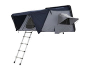 DesertX Basecamp hardshell rooftop tent in grey and navy blue with an attached aluminum ladder. Spacious and durable for family outdoor adventures.