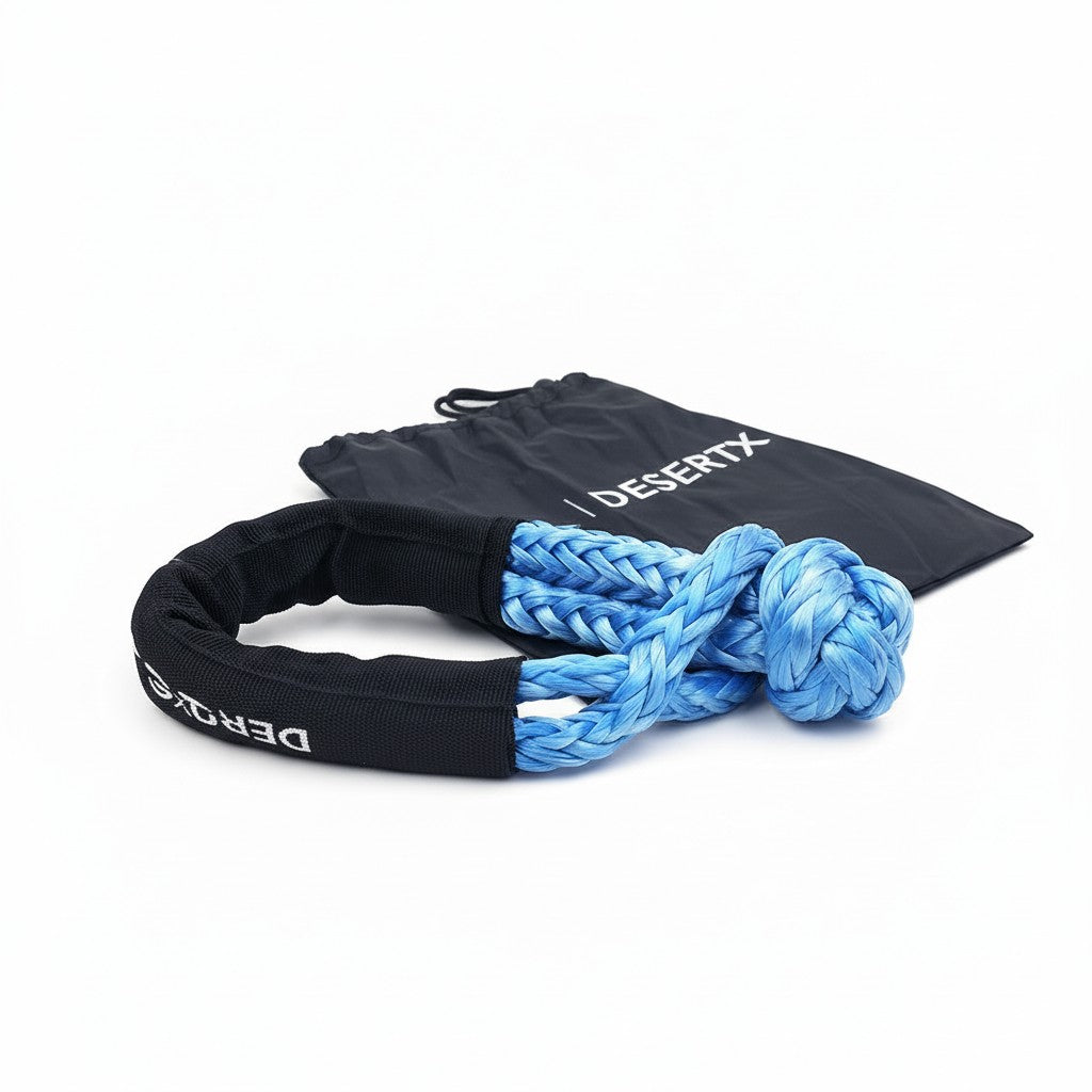DesertX blue UHMWPE soft shackle with 18 ton capacity and black protective sleeve, includes storage bag.