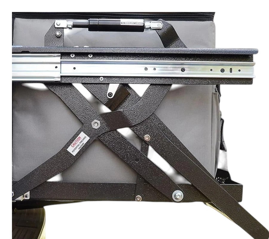 DesertX Drop Slider, a galvanized steel vehicle fridge slider with hydraulic telescopic rod for easy access to coolers.