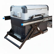 DesertX Drop Slider for vehicle fridges, made of galvanized steel with a hydraulic telescopic rod for easy access.